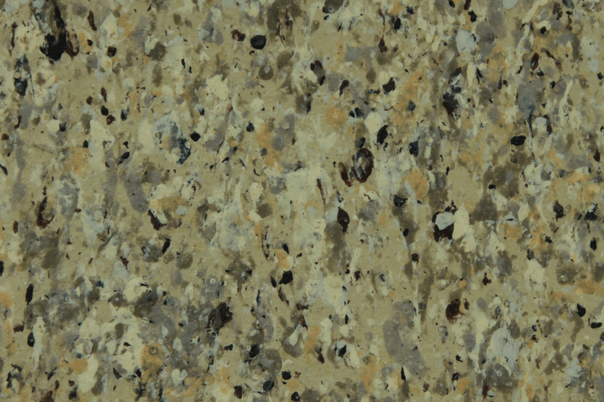 macro texture of deep black granite finish with obsidian flakes