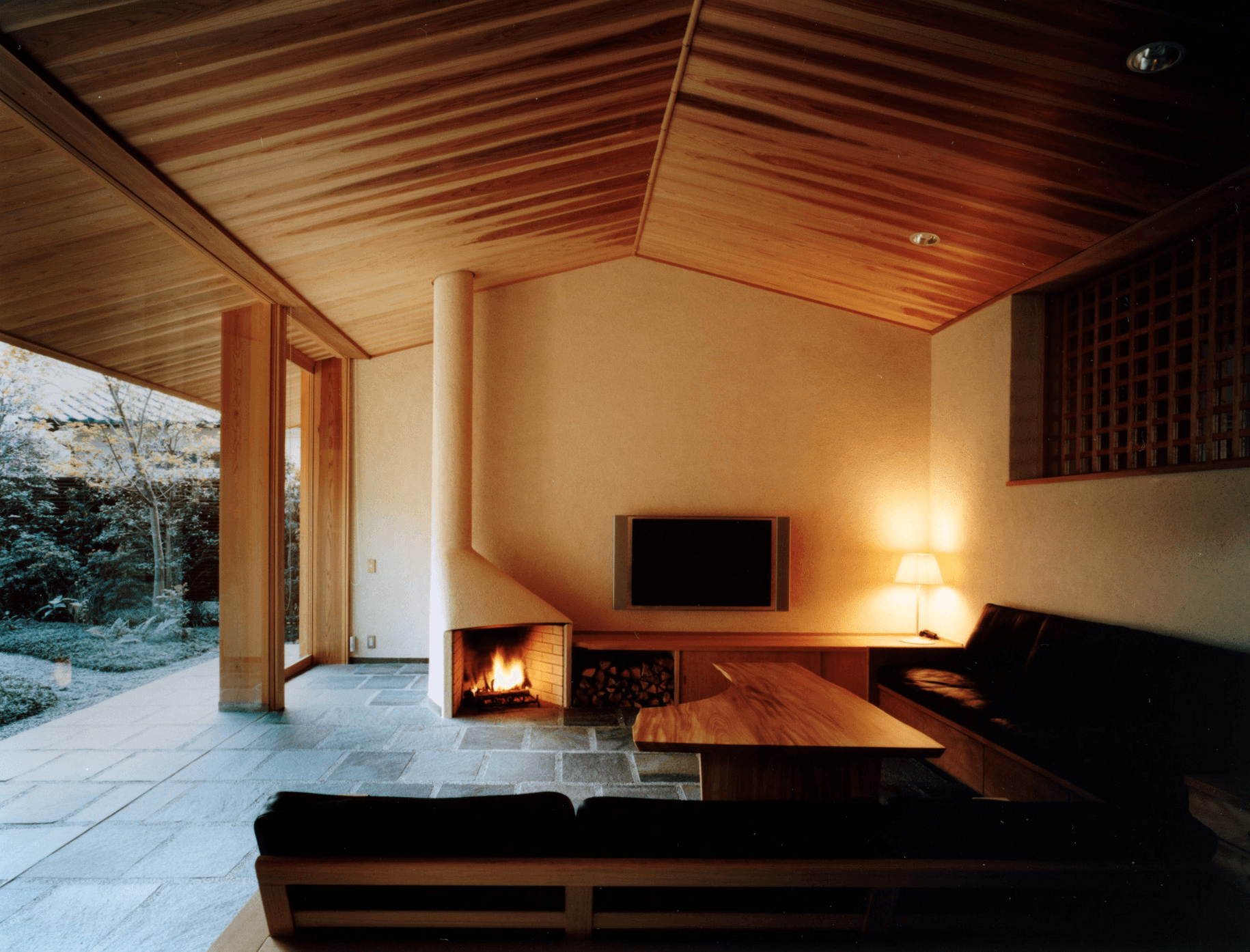japanese restaurant interior with soft flat plaster walls, warm wood accents, serene atmosphere
