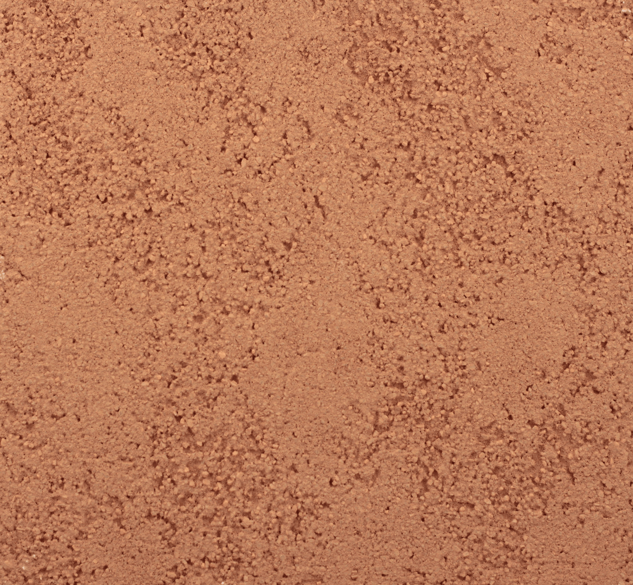 macro texture of warm mocha brown travertine polished plaster finish