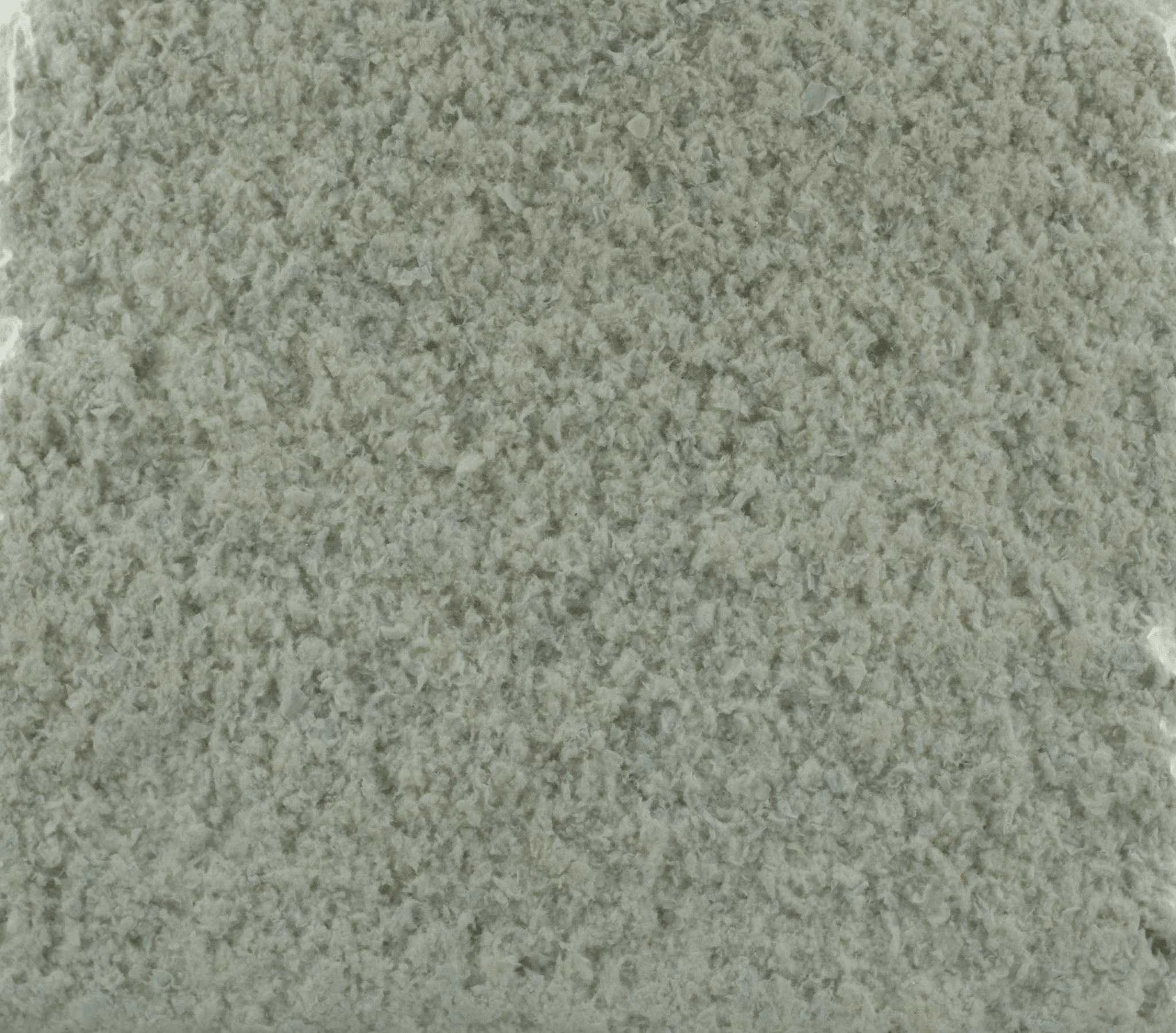 macro texture of coarse rough aggregate ceiling plaster finish, dramatic raking light, warm earthy tone