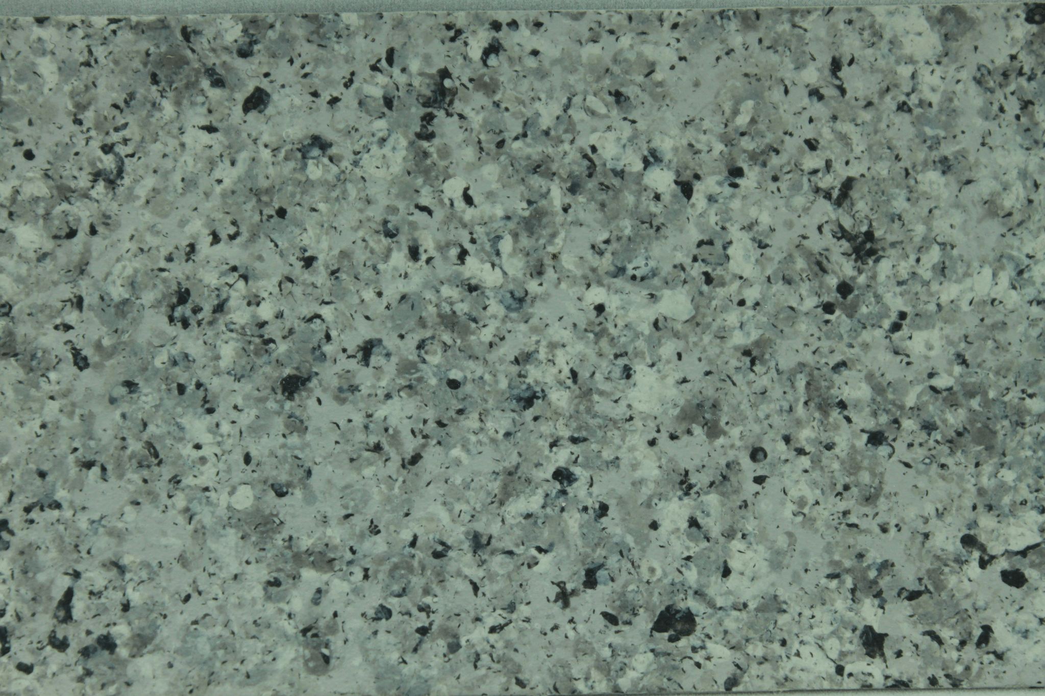 macro close up of sophisticated grey granite architectural coating texture