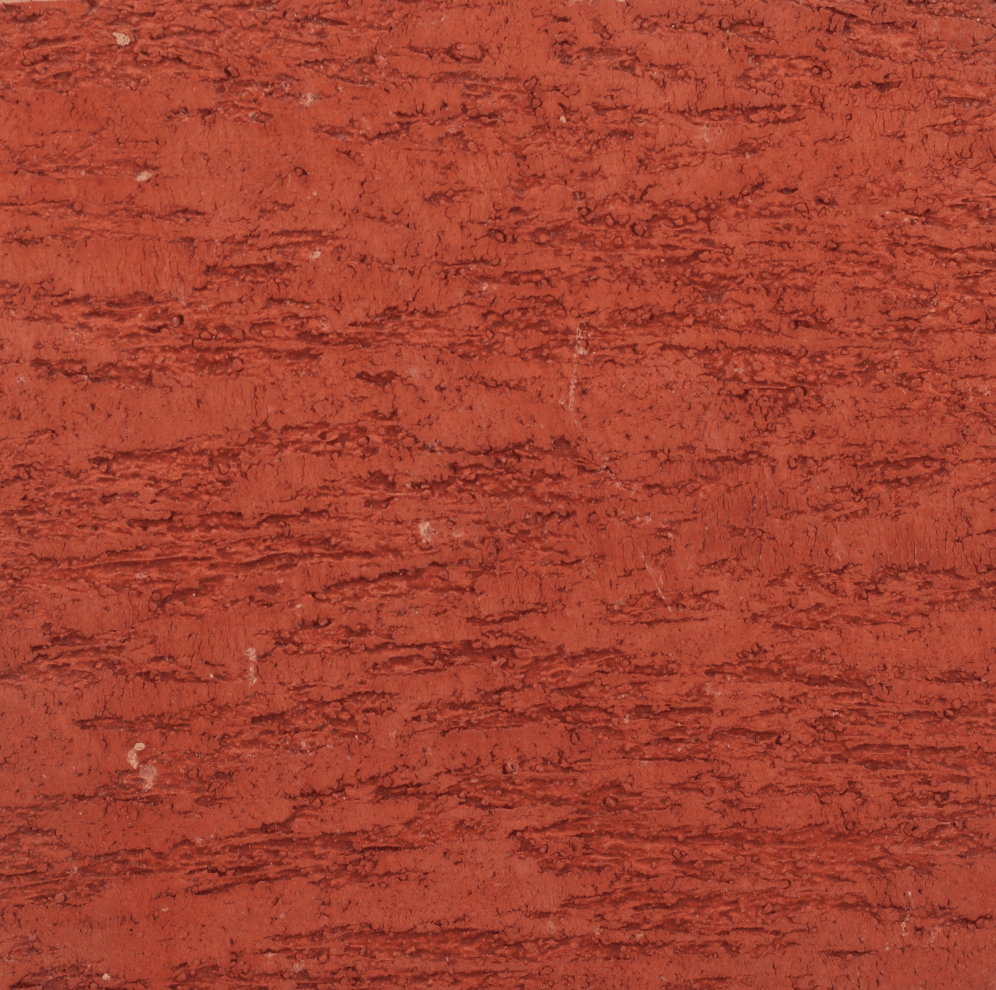 macro texture of warm honey amber polished plaster finish