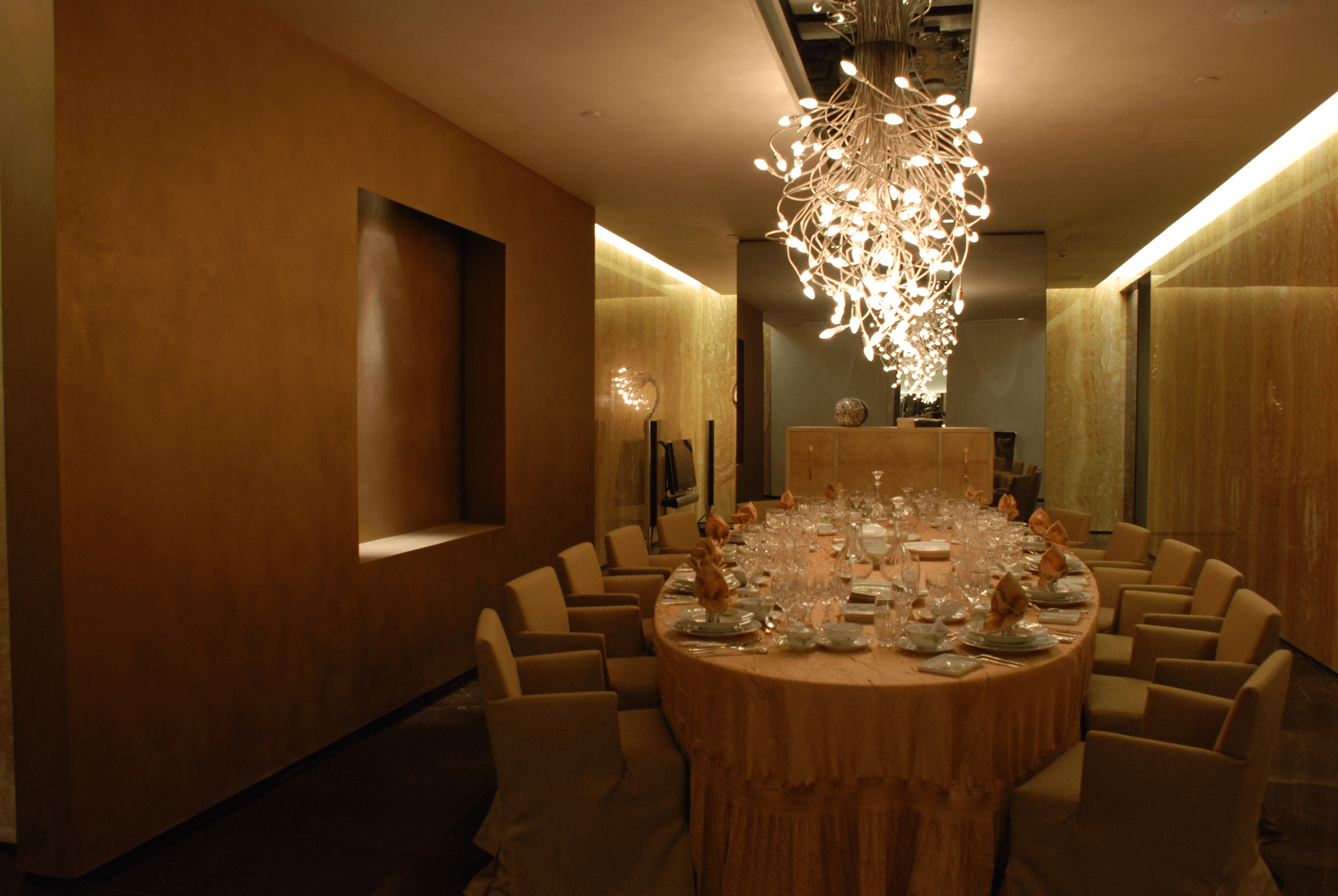 luxury hotel lobby with polished marmorino plaster walls, elegant gold accents