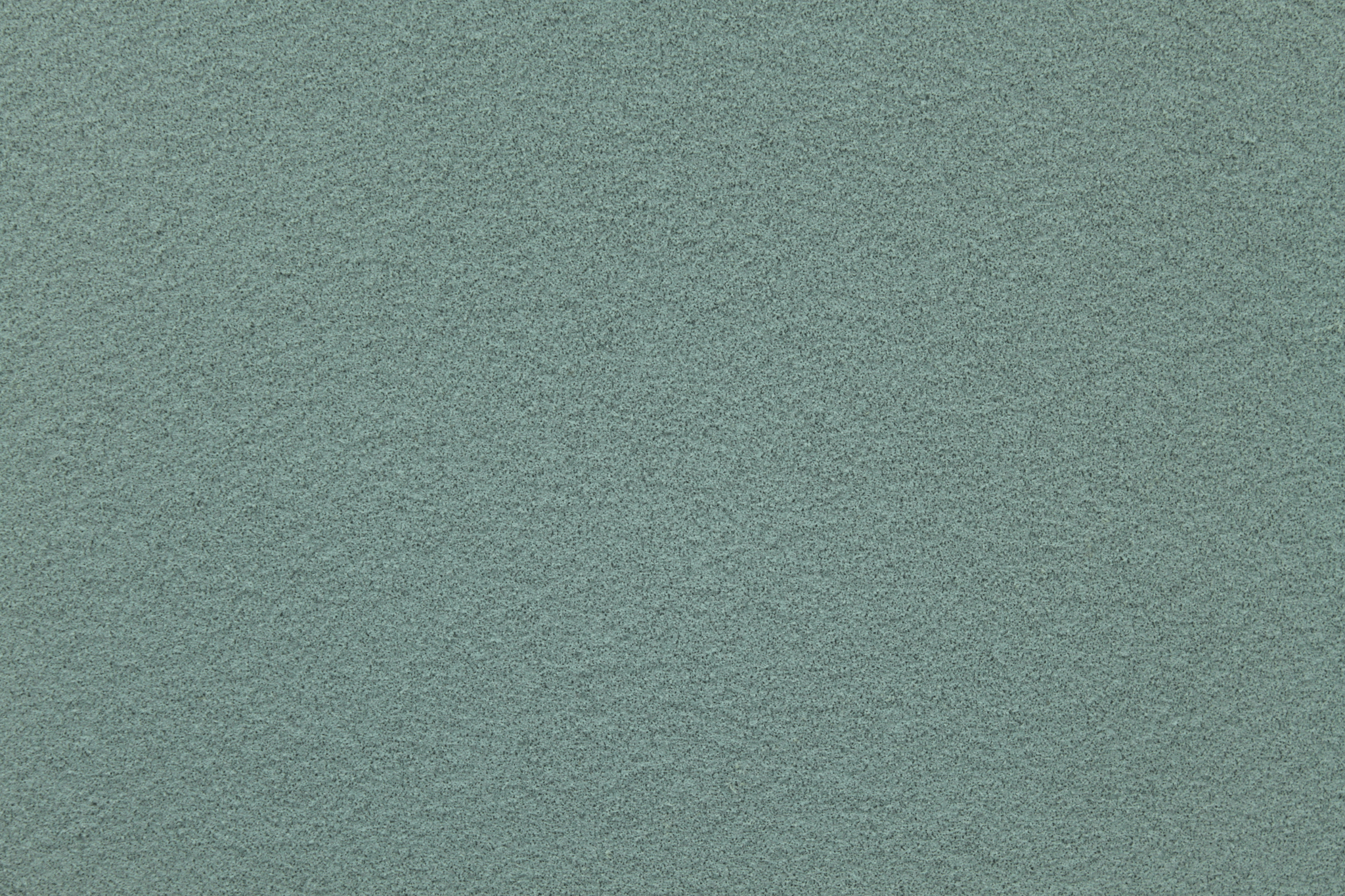 macro texture of carrara white italian aggregate plaster, fine white mineral grains
