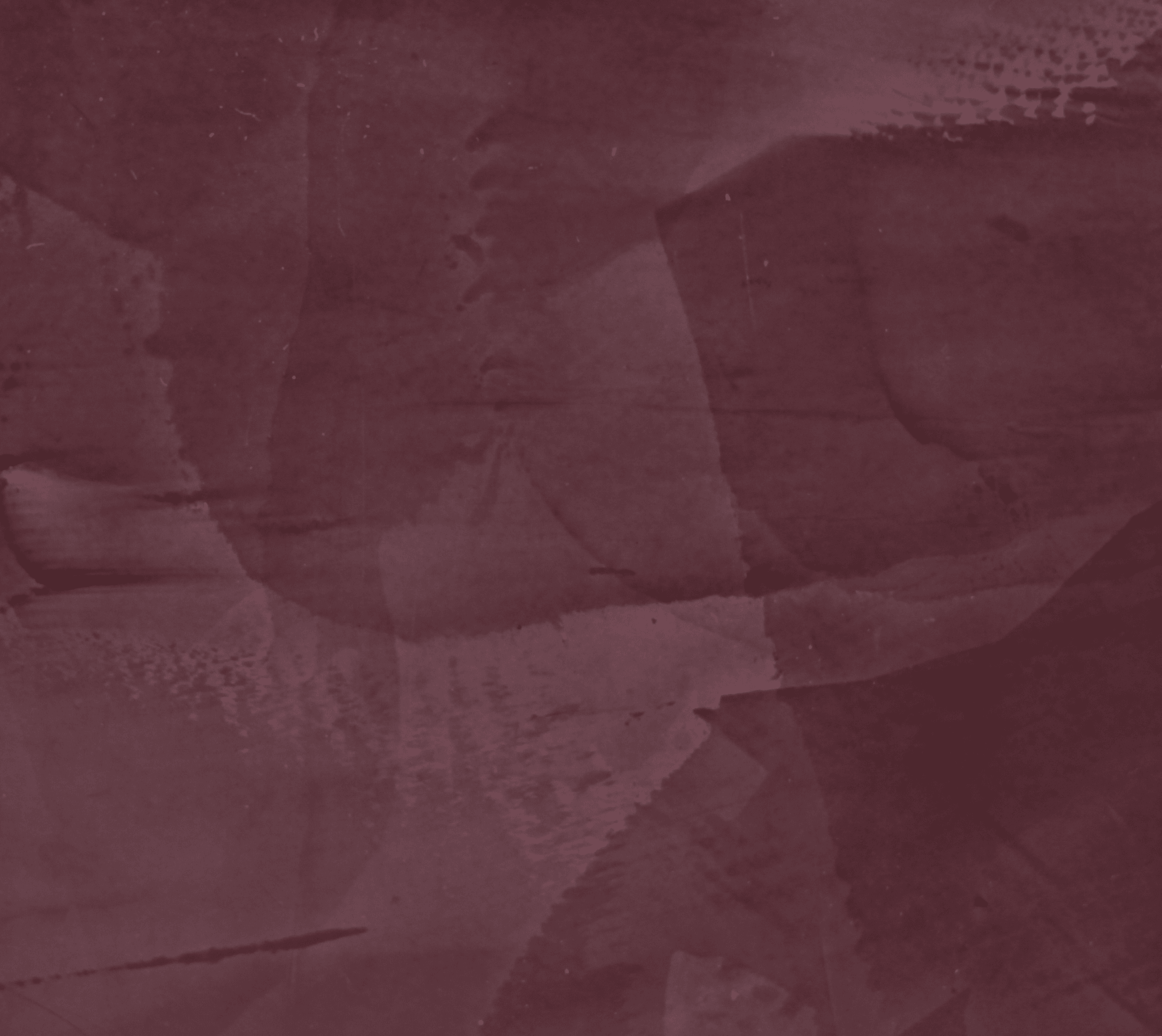 macro texture of burgundy red polished plaster finish, antique effect
