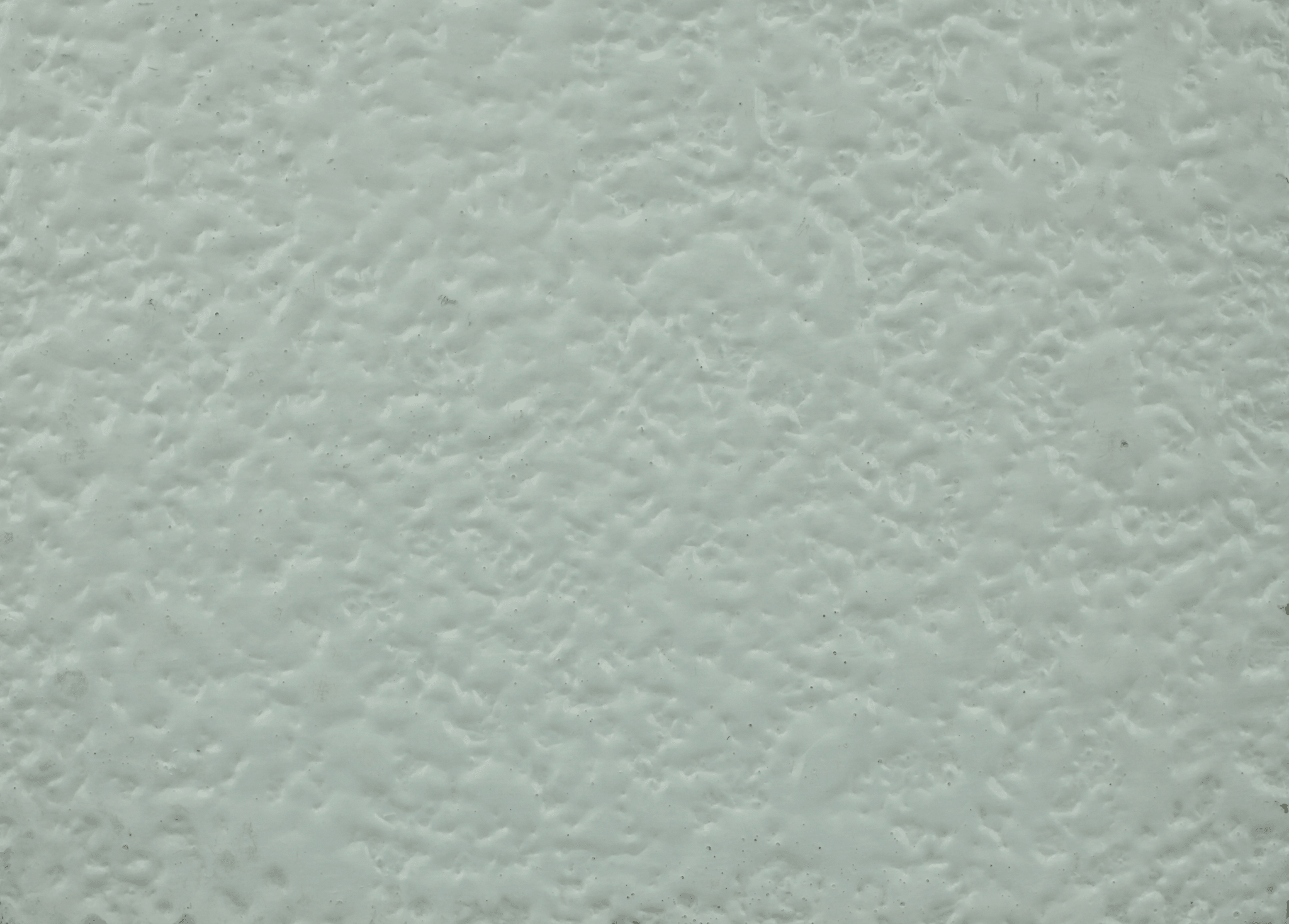 macro texture of professional architectural texture coating, expressive trowel marks, mineral depth