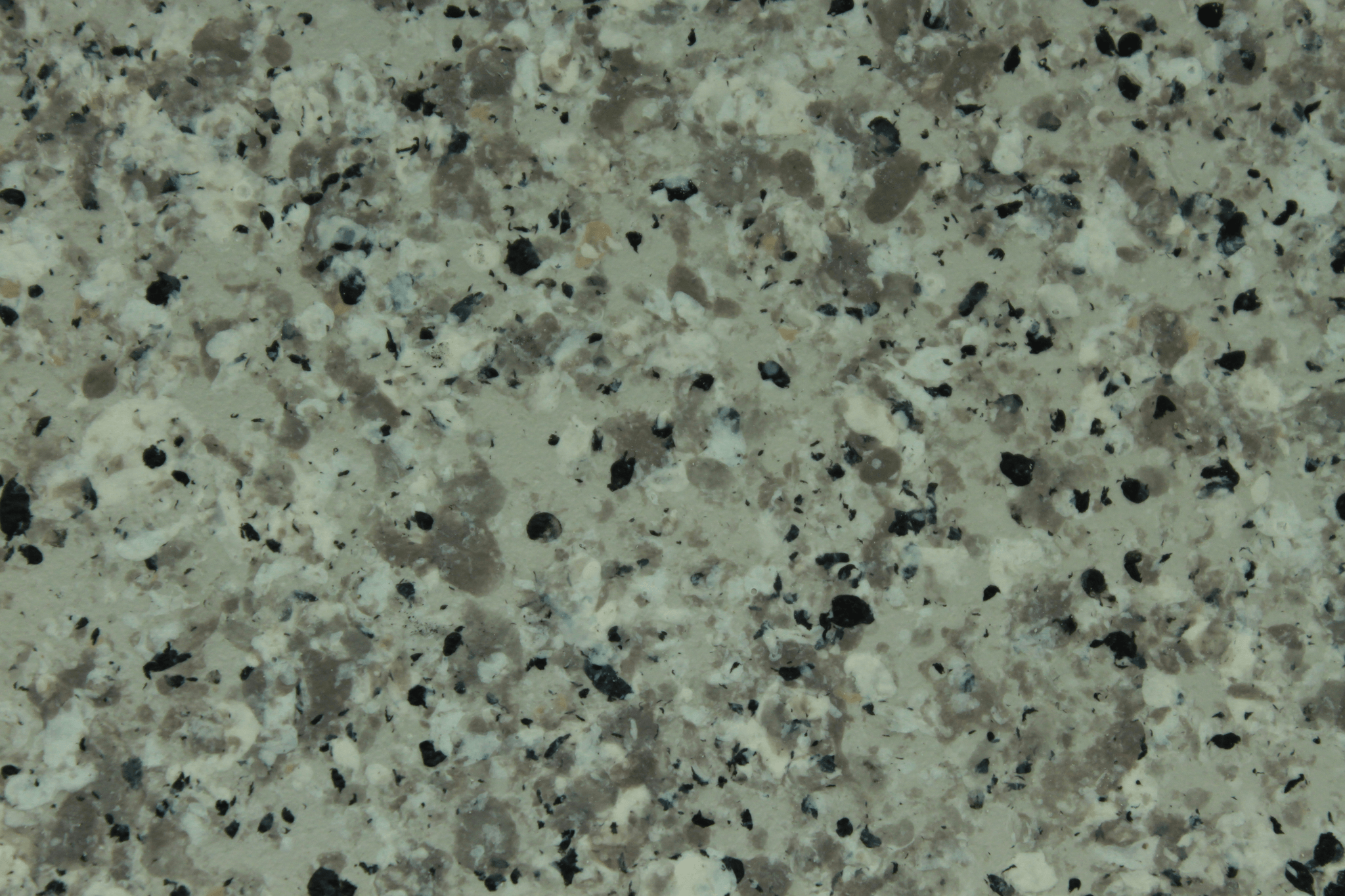 macro texture of charcoal granite finish with mica sparkle
