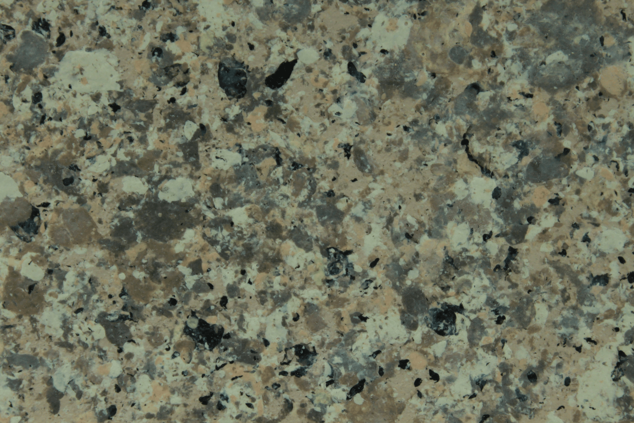 macro texture of grey granite finish with black and white flakes